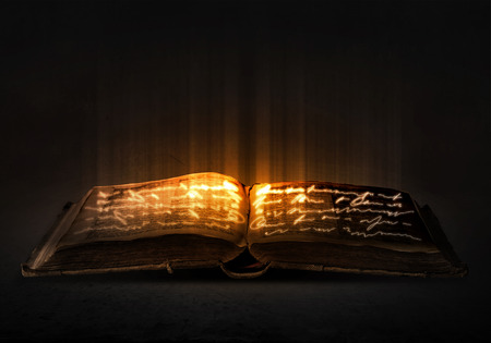 42989017-old-black-magic-book-with-lights-on-pages.jpg