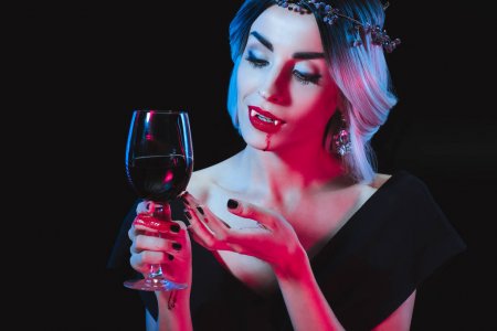 depositphotos_213766144-stock-photo-sexy-vampire-woman-holding-wineglass.jpg