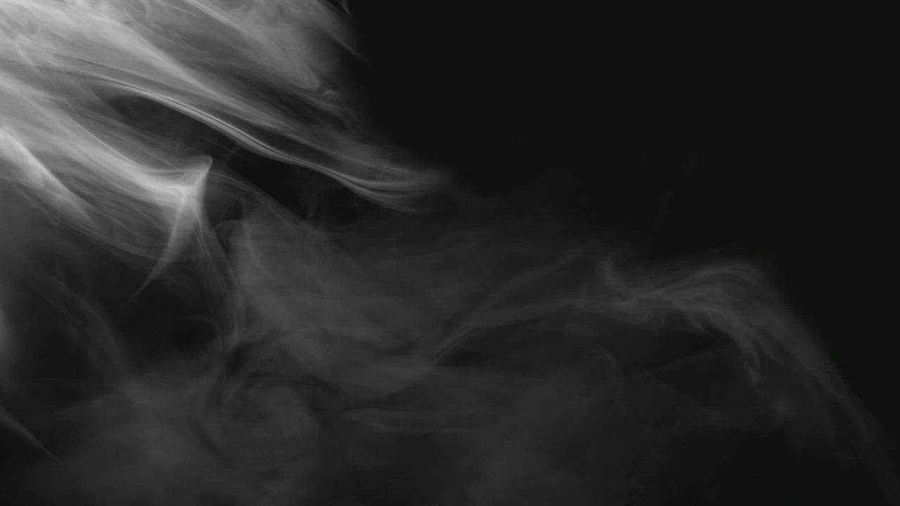 mixkit-smoke-drifting-in-the-dark-8501-0_28129.jpg