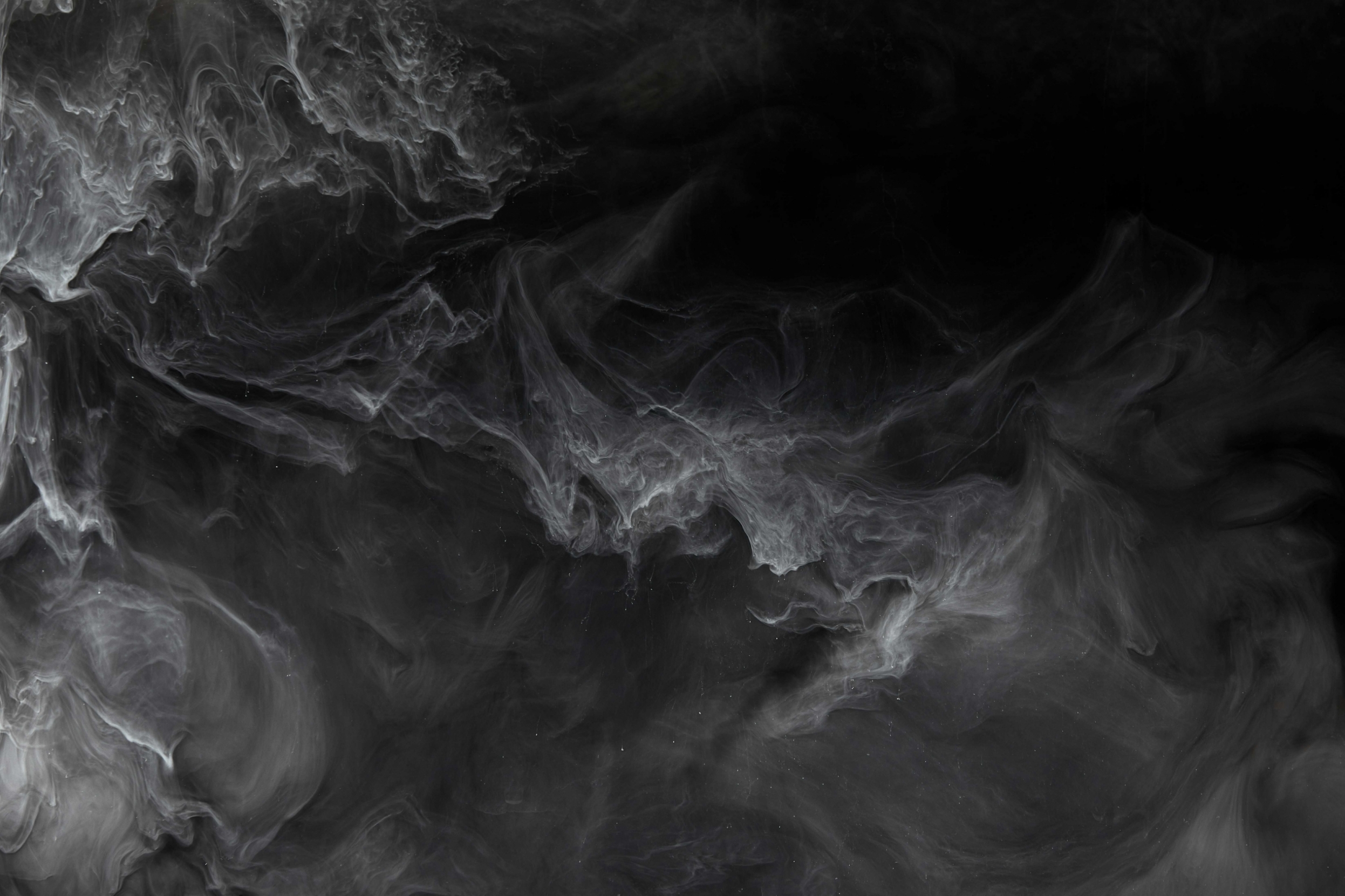 abstract-splash-of-grey-paint-on-black-background-U4DZ4J7.jpg