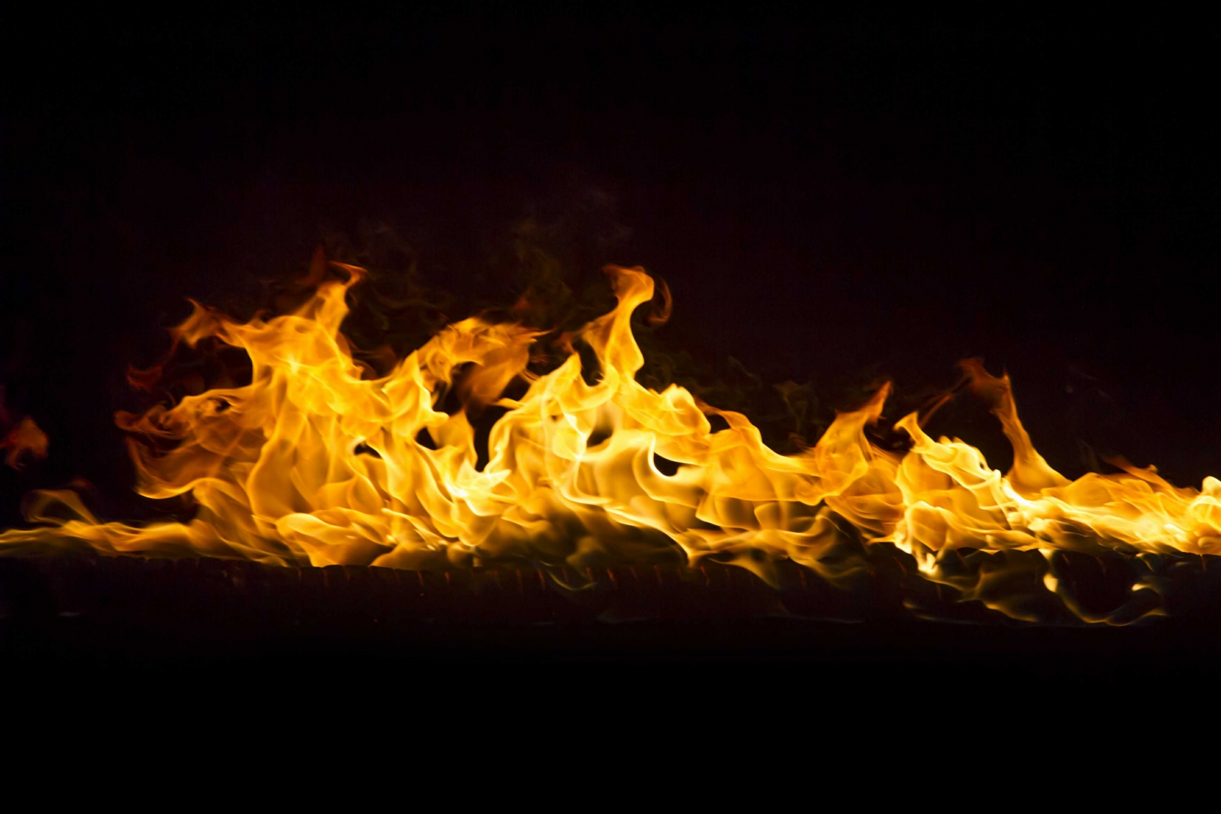 blazing-flames-on-black-background-CVCS8QM~0.jpg