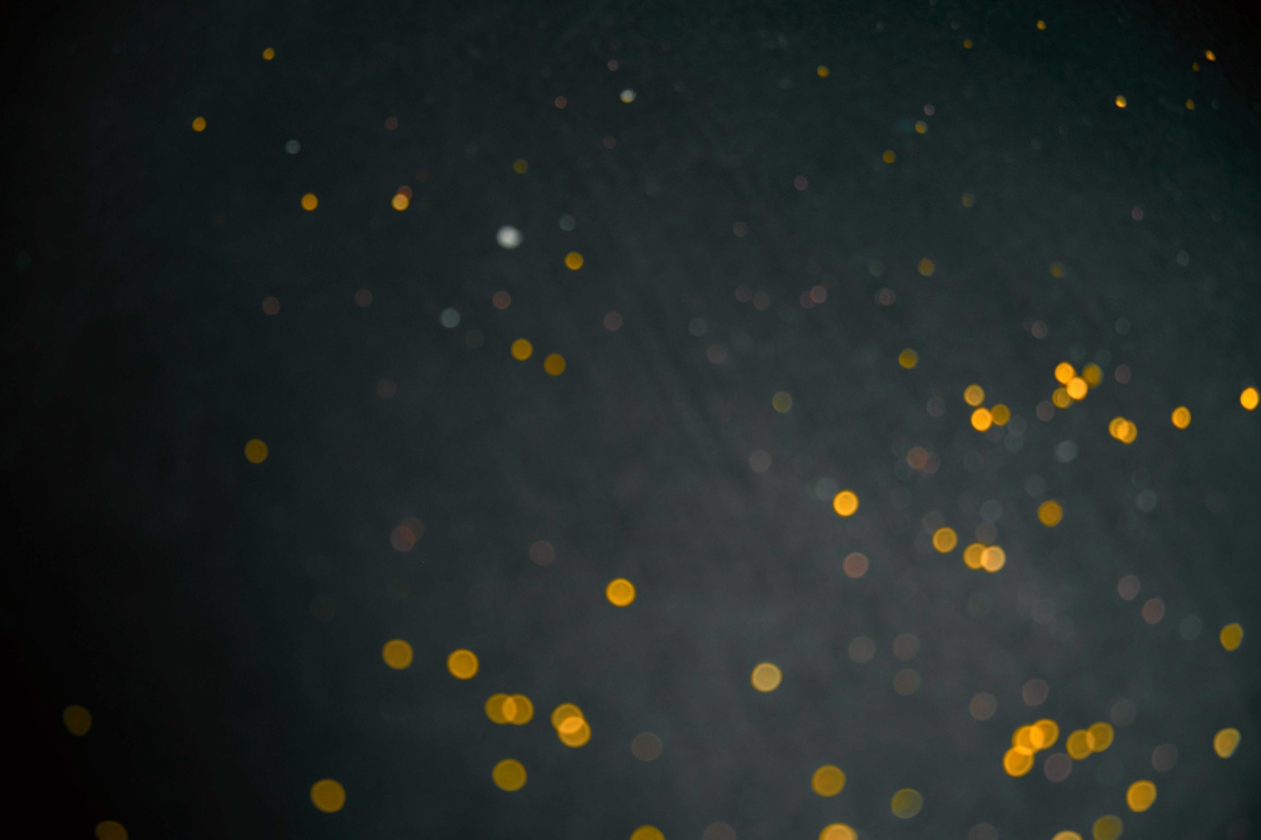 blurred-golden-bokeh-texture-on-a-black-background-abstract-art-backdrop-background-blink-blur_t20_8dvo6W~0.jpg