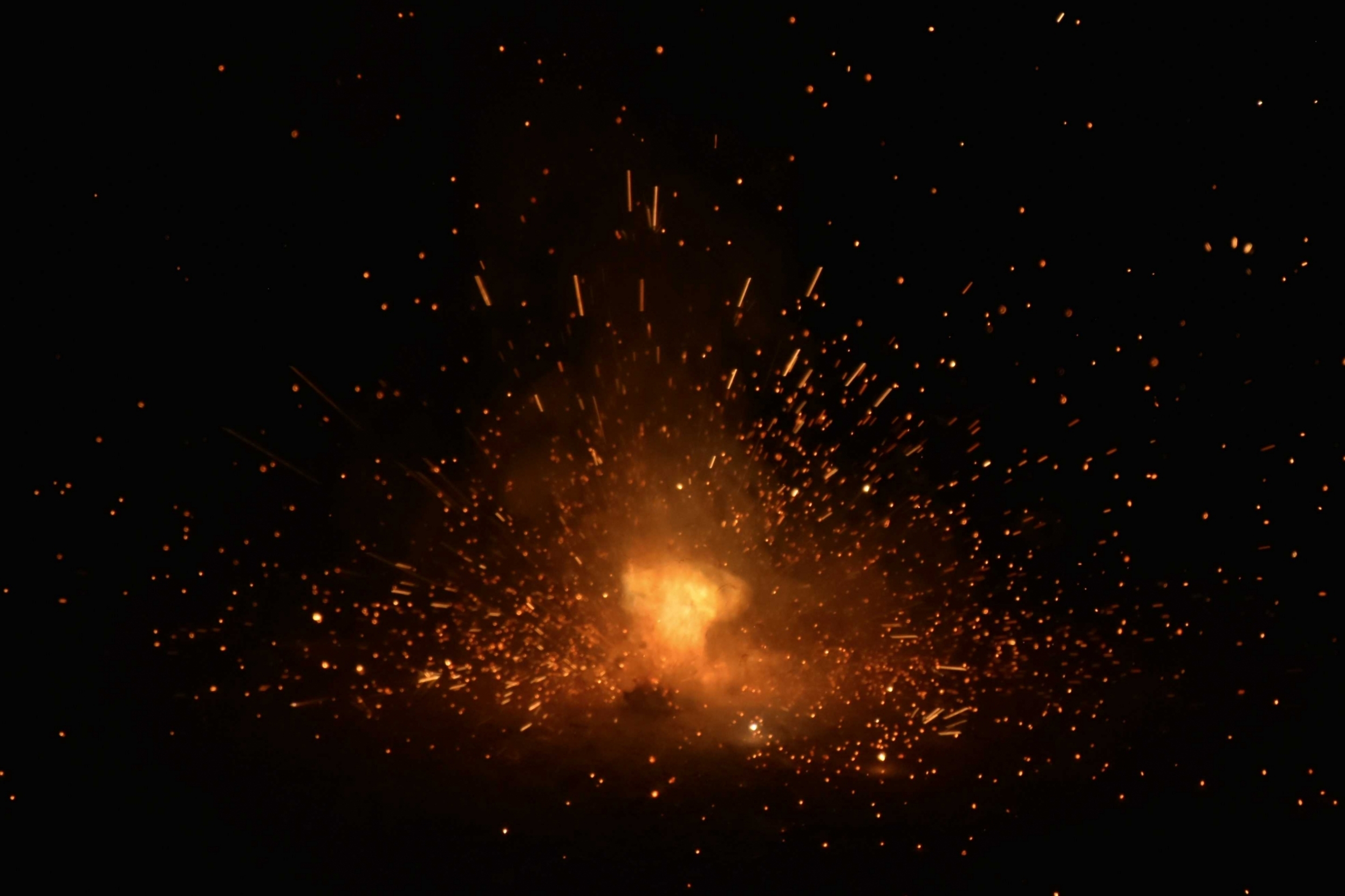 normal_burning-sparks-flying-beautiful-flames-fiery-orange-glowing-flying-away-particles-on-black-background_t20_gRxn1G_0.jpg