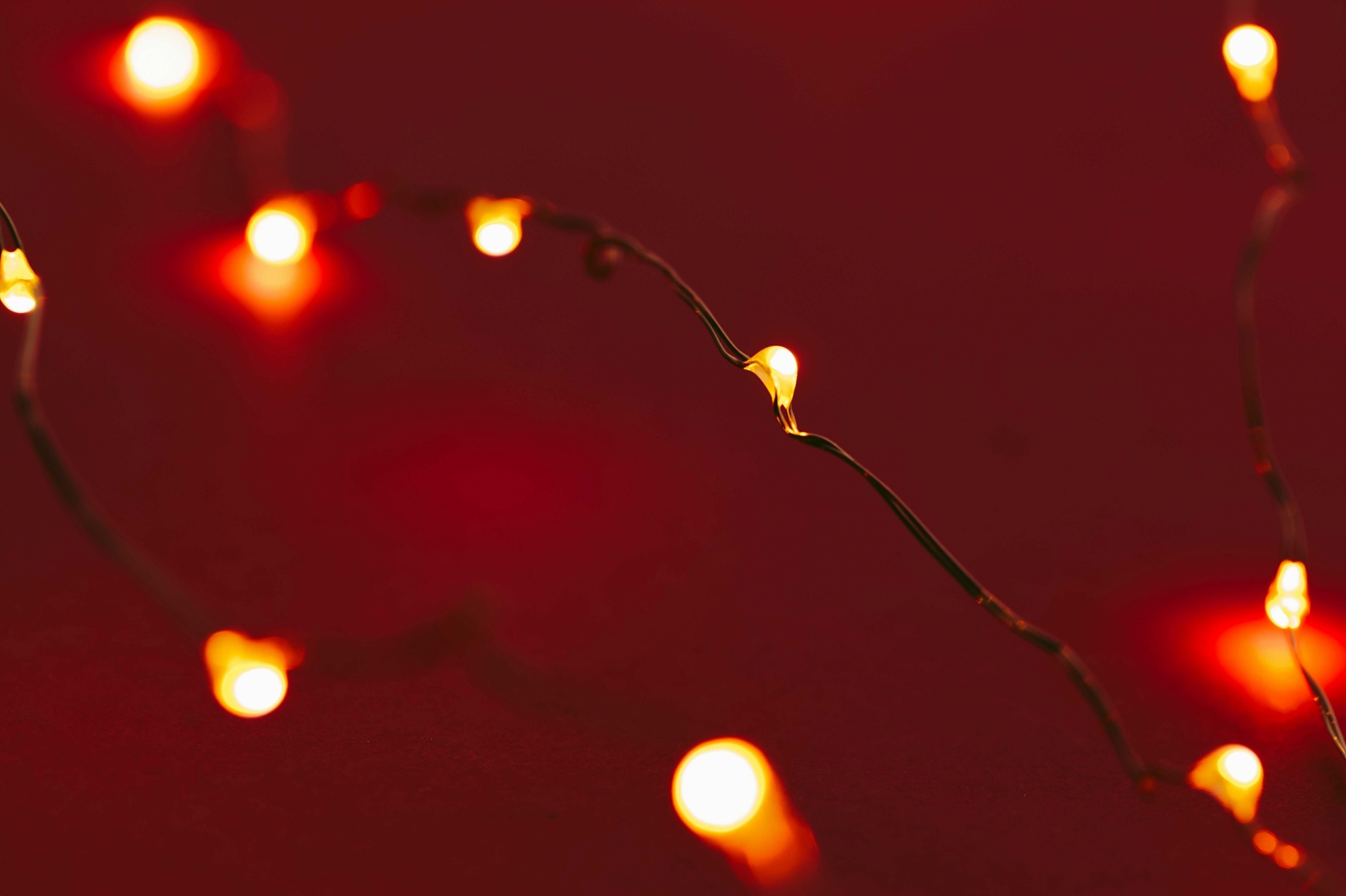 red-background-with-illuminated-lights-of-garland-2021-10-13-02-00-15-utc~0.jpg