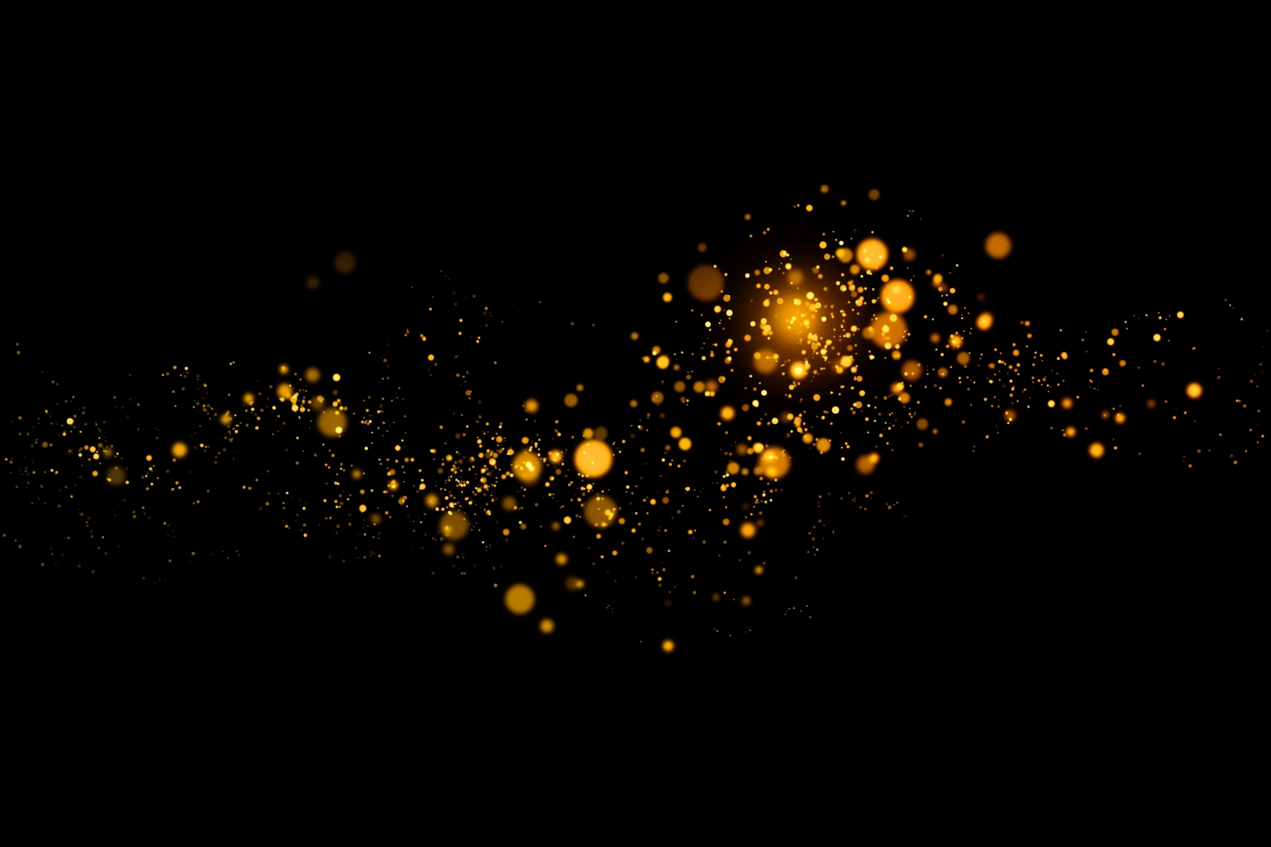 vecteezy_blurred-gold-circles-on-black-background_1948176.jpg