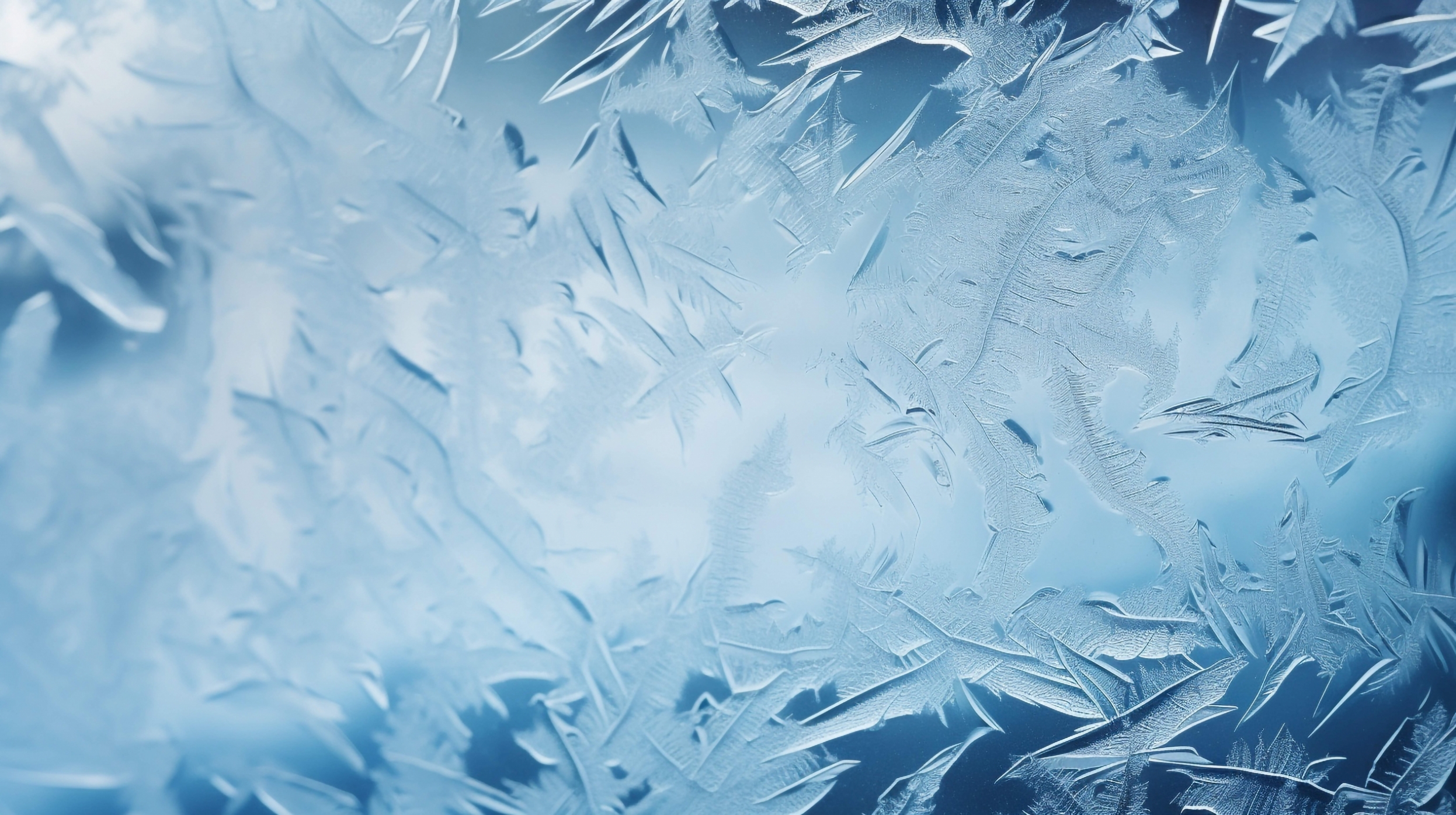 vecteezy_frost-patterns-on-a-window-depicting-ice-crystals-conveying_28559048_832.jpg