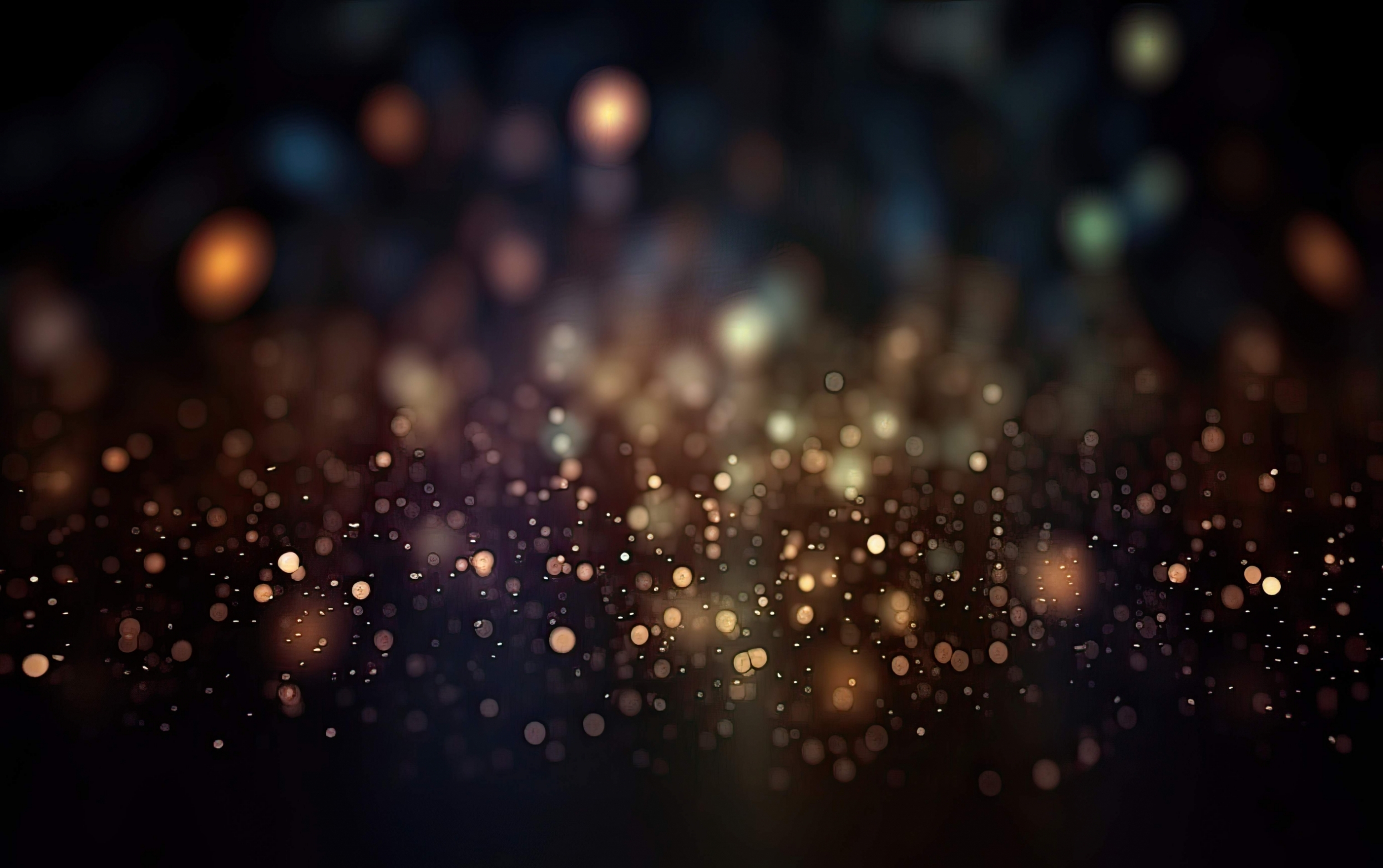 vecteezy_glittering-shine-bulbs-lights-background-blur-of-christmas_22676075_345.jpg