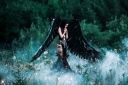 Pretty-girl-demon-with-black-wings-Stock-Photo-02.jpg