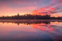 beautiful-vivid-sunrise-by-the-lake-with-amazing-c-6GRXVHN.jpg