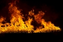 blazing-flames-on-black-background-ZWRJD5D.jpg