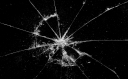 broken-glass-black-background-cracks-in-the-glass-cobwebs-on-the-glass.jpg