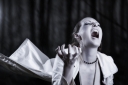 depositphotos-11725339-stock-photo-young-woman-screaming-vampire-style.jpg