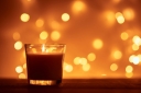 silhouette-of-burning-candle-with-a-golden-blurred-2022-01-05-19-12-50-utc.jpg