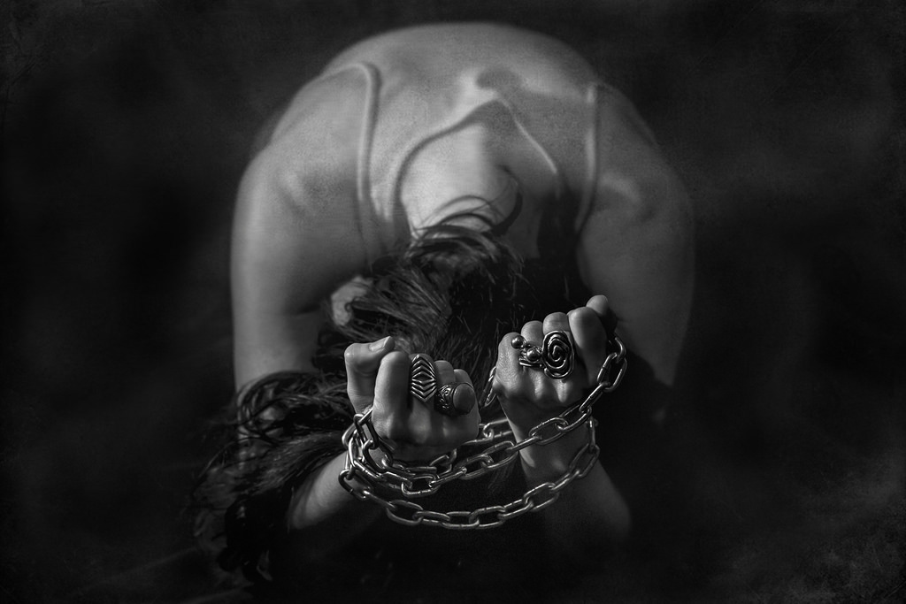 woman_hands_chains_bnw-766153.jpg