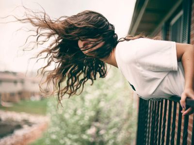 1600x1200-4564544-hair-women-brunette-long-hair-model-bent-over-balcony-wind~0.jpg