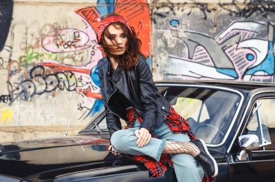 a-brunette-red-haired-girl-in-a-casual-style-black-leather-jacket-with-light-slinky-tights-jeans-in-a_t20_wLOVJ0~0.jpg