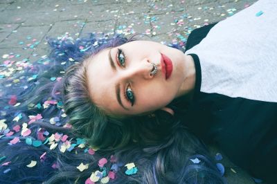 beautiful-young-woman-surrounded-by-confetti-2021-08-26-18-56-41-utc~2.jpg