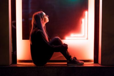 millennial-enigmatic-pretty-girl-with-unusual-dyed-hairstyle-near-glowing-neon-wall-at-night-blue_t20_Gg3wP0~8.jpg