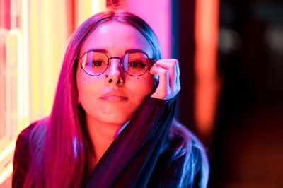 millennial-enigmatic-pretty-girl-with-unusual-dyed-hairstyle-near-glowing-neon-wall-at-night-blue_t20_ywQVER~8.jpg