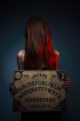 ouija-board-for-divination-girl-holding-a-ouija-b-2022-01-18-17-28-53-utc~2.JPG