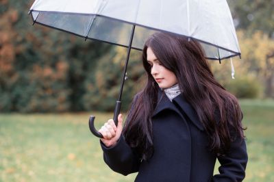 portrait-of-a-pensive-girl-with-long-black-hair-in-black-clothes-under-a-transparent-umbrella-female_t20_NGVG1Q~8.jpg