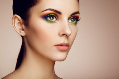 portrait-of-beautiful-young-woman-with-rainbow-mak-2021-08-26-17-05-23-utc~0.jpg