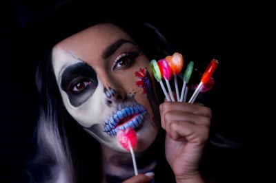 vecteezy_spooky-portrait-of-woman-in-halloween-gotic-makeup-holding_15859255_94~0.jpg