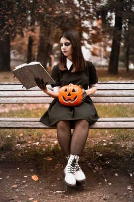 woman-in-black-long-sleeve-shirt-sitting-on-bench-holding-3318607~8.jpg