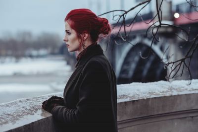 woman-wearing-black-coat-standing-in-front-of-balcony-892771~8.jpg