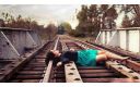 sad-girl-lying-on-railway-track-1440x900~8.jpg