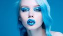 vecteezy_blue-eyed-beauty-with-fresh-blue-background-elegance_25117048_526~0.jpg