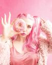 woman-covered-her-right-face-with-pink-doughnut-2064662~8.jpg