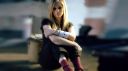 ws_Avril_Lavigne_Arms_Crossed_1366x768.jpg