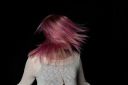 young-woman-swinging-her-pink-hair_t20_e3pY7b~8.jpg